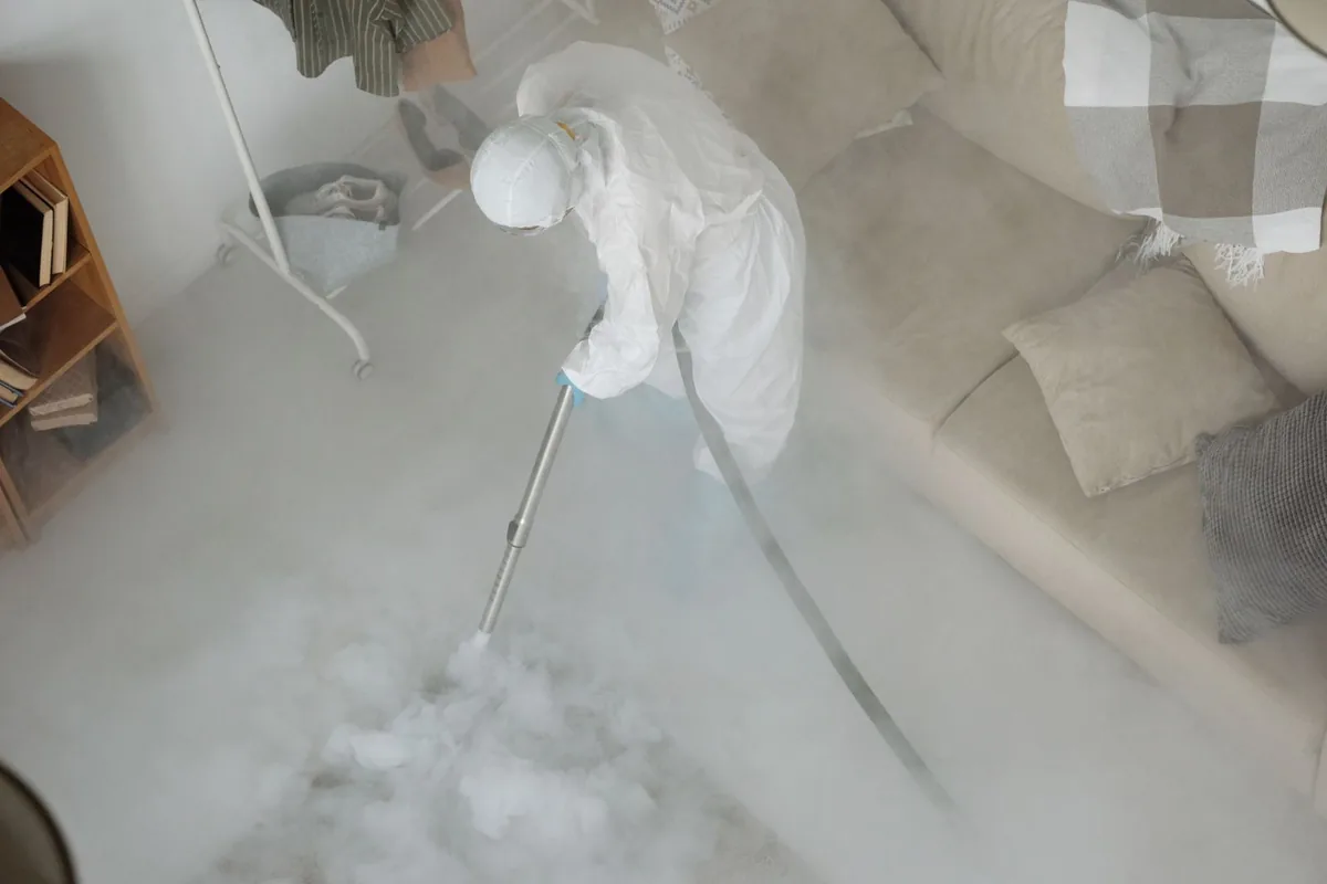 Biohazard cleanup technician in protective equipment, Cedar Hill, TX